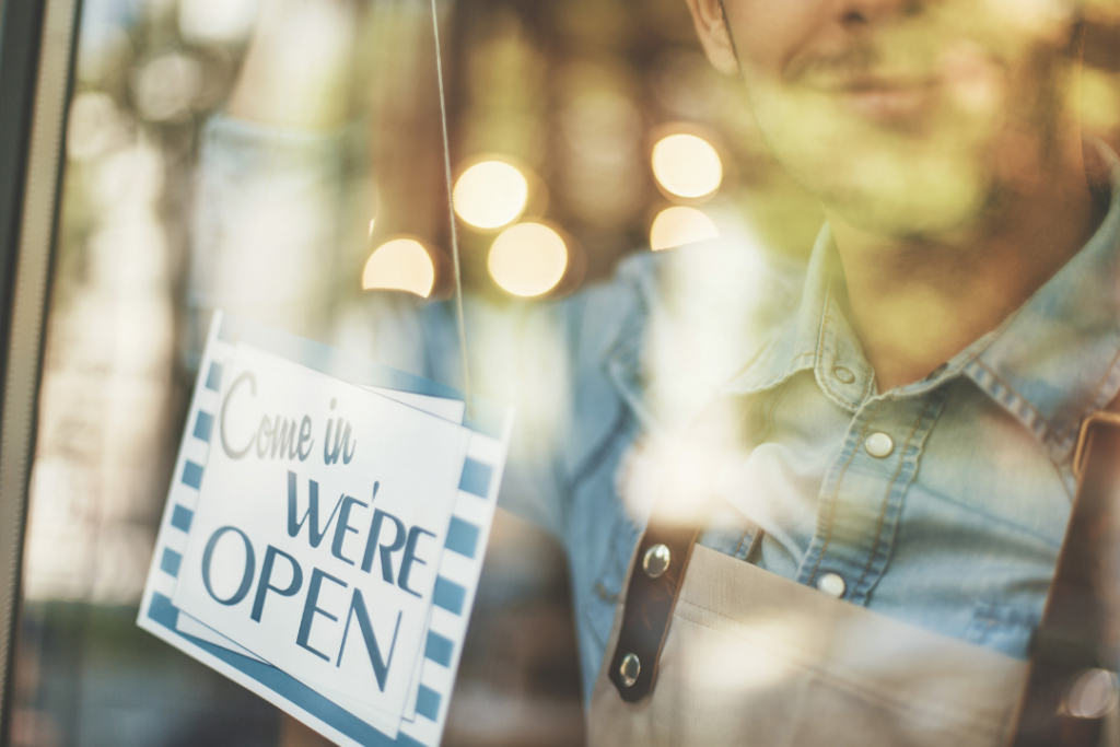 small business with a come in were open sign